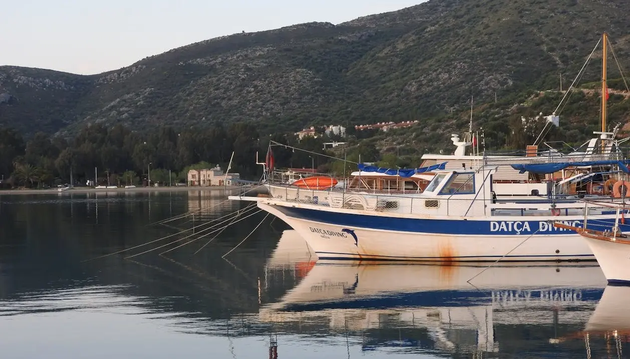 The yacht is docked at the marina