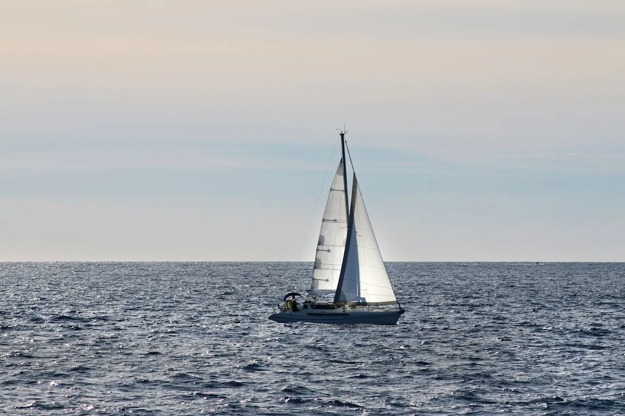 Sailboat travelling on the sea